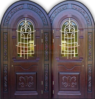 Индивидуальная арочная дверь со стеклом и ковкой ДА-19 в Сургуте