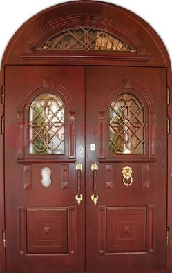 Стальная арочная дверь со стеклом и ковкой ДА-30 в дом из кирпича в Красноармейске